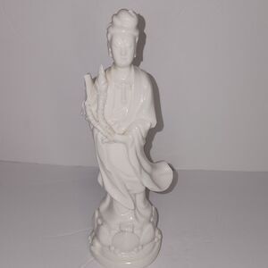 Porcelain Kuan Yin Figurine holding flowers